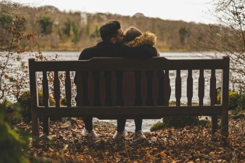 mature man showing emotional vulnerability to his woman