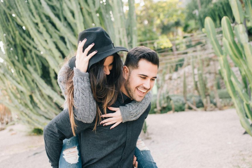 mature man showing affection to his woman