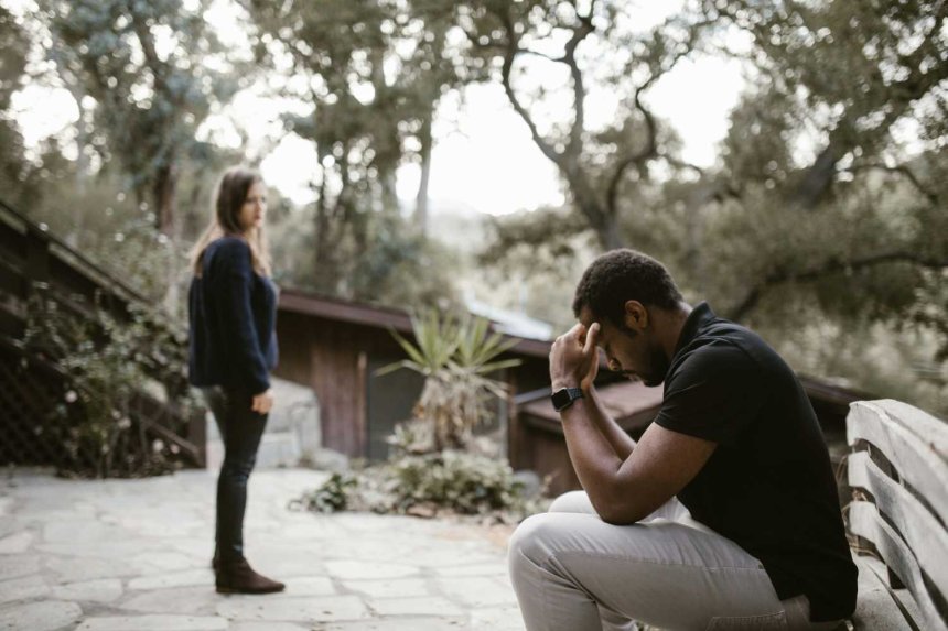 upset man and heartbroken woman after breakup