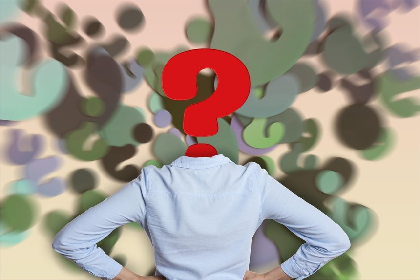 question mark over man's head as he contemplates answers