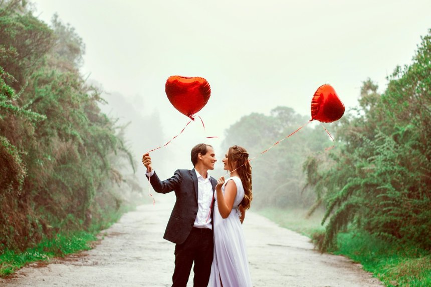 happy couple celebrating valentines outdoors