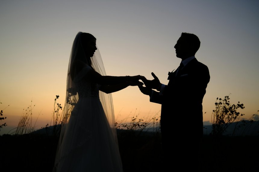 devoted man and woman holding hands