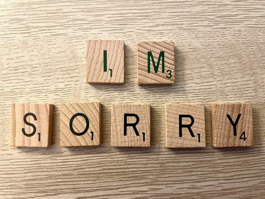 letters arranged to say an apology