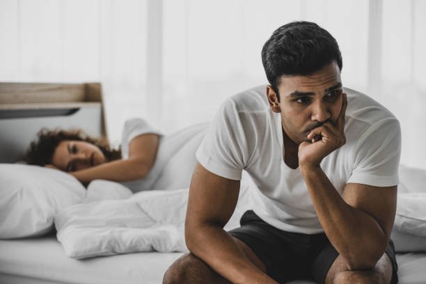 betrayed husband contemplating what to do after pregnant wife cheated